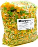 HERONS - Pond Flakes 1 KG - 10L - For Koi, Carp and Other Pond and Coldwater Fish - With Essential Vitamins, Minerals and Trace Elements - Supports Healthy Immune System - Does Not Cloud Water - Image 2