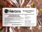 HERONS - Tropical Flakes - For all Tropical Fish - Guppies, Bettas, Neons, Cichlids, Angelfish, Swordtails - Multi-Nutrient Complex - Supports Growth, Colouration and Immune System - 100 Grams - Image 3